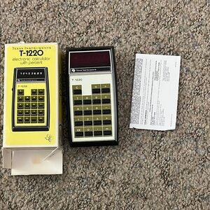 Texas Instruments T-1220 Yellow and Black Calculator